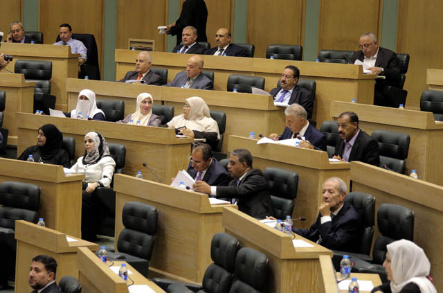 Lawmakers are seen during a session on Tuesday (Photo by Osama Aqarbeh)